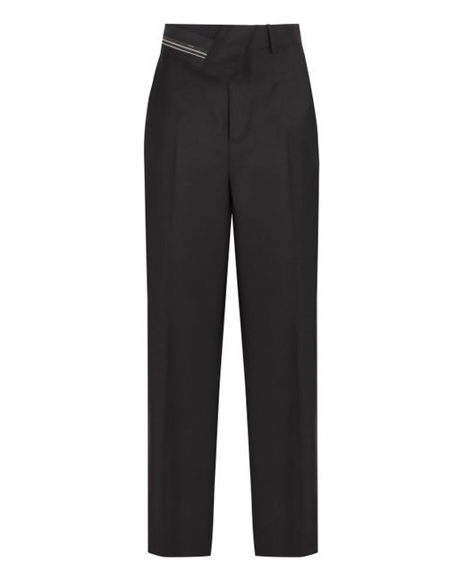 Pantaloni carrot-fit in lana di Fendi in Black