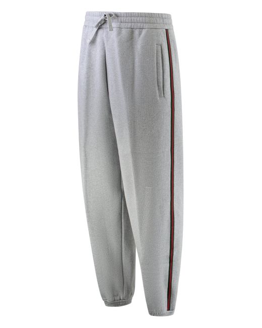 Pantaloni in felpa con banda a contrasto di Gucci in Gray da Uomo