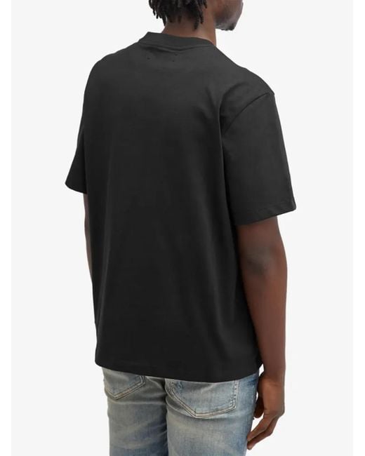 Amiri Black Staggered Logo Print T-Shirt for men