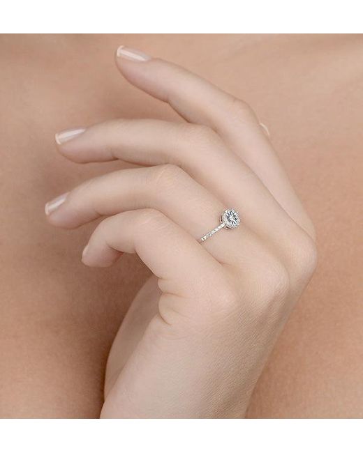 The Diamond Store White Halo Ring With 0.11Ct Of Diamonds Set
