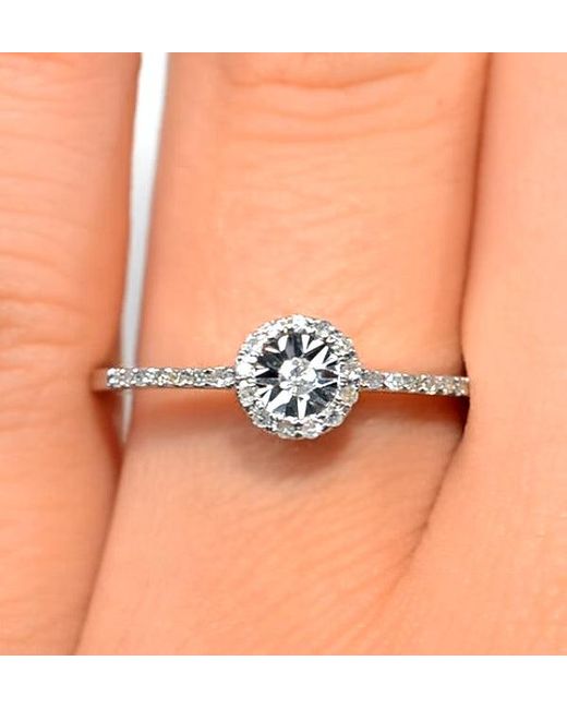 The Diamond Store White Halo Ring With 0.11Ct Of Diamonds Set