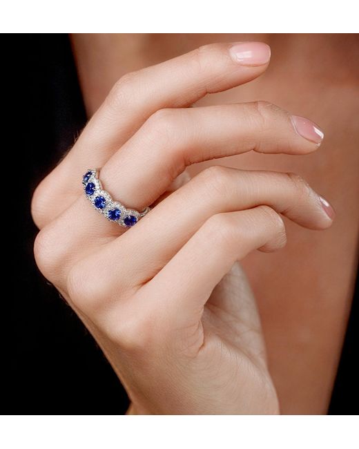 The Diamond Store Blue Sapphire And Diamond Halo 5 Stone Asteria Ring