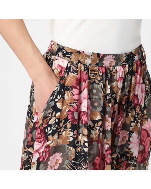 Pantalone in seta con stampa floreale di Chloé in Red
