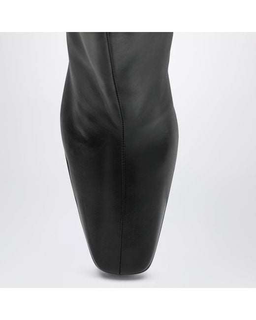 Tronchetti Neri di Prada in Black