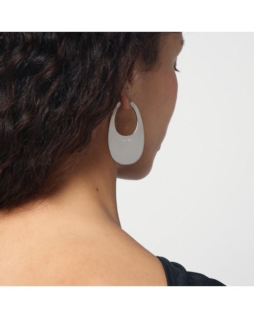Orecchini swipe grandi argento di Coperni in White