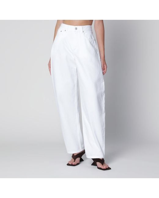 Alaïa White High-Waisted Curved-Leg Denim Jeans