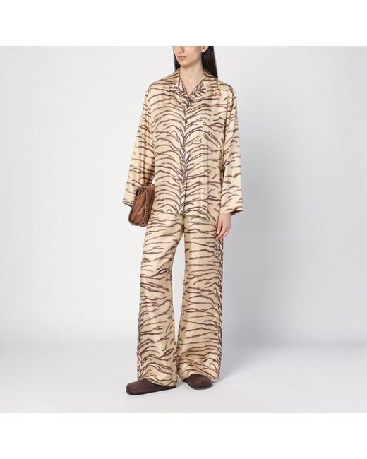 Pantalone in seta con stampa tigrata di Stella McCartney in Natural