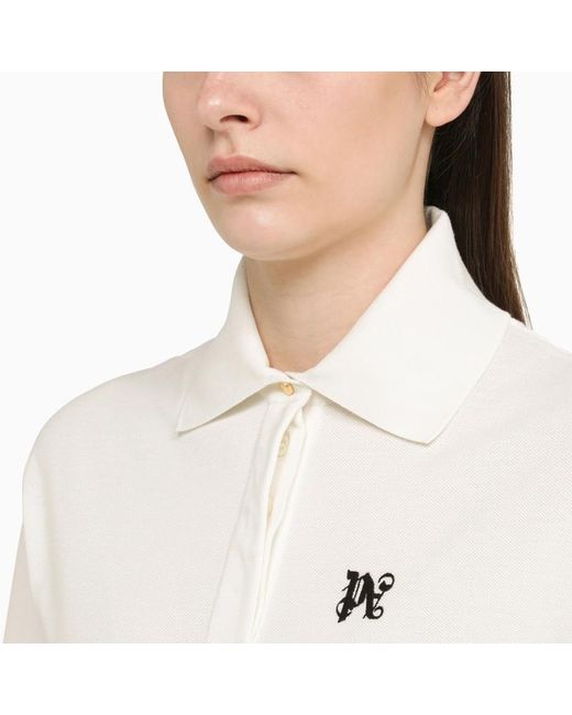 Polo cropped bianca in cotone con logo di Palm Angels in White