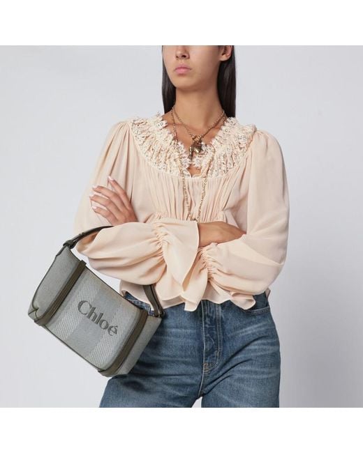 Borsa carry a righe verde scura in tela di Chloé in Metallic
