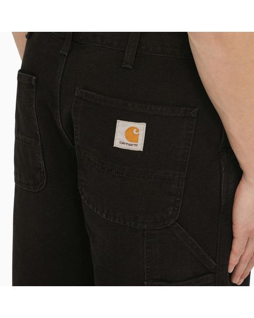 Single knee pant black aged canvas in tela di cotone biologico di Carhartt da Uomo