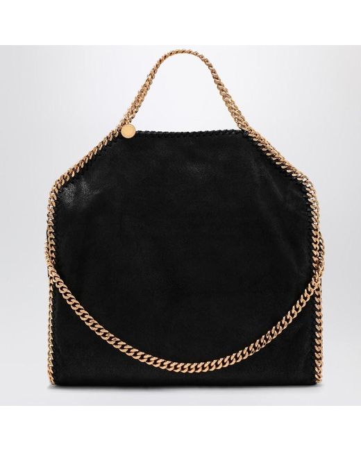 Borsa falabella fold over nera/oro di Stella McCartney in Black