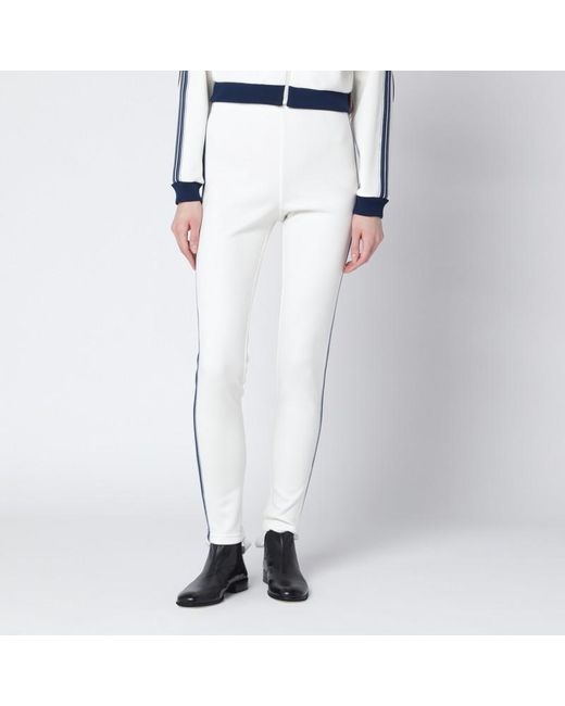 Leggings avorio in tessuto tecnico di Prada in White