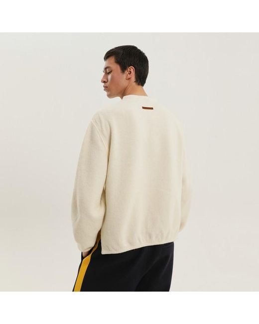 Maglione a coste con spacchi di 1989 STUDIO in Natural da Uomo