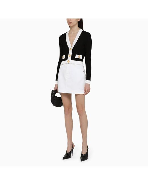 Cardigan bianco/ con bottoni dorati di Balmain in Black