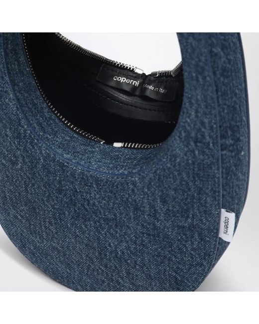 Mini swipe bag in denim di Coperni in Blue