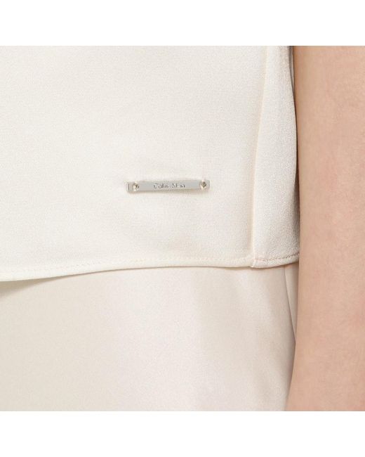 Blusa smanicata color vaniglia in viscosa di Calvin Klein in Natural