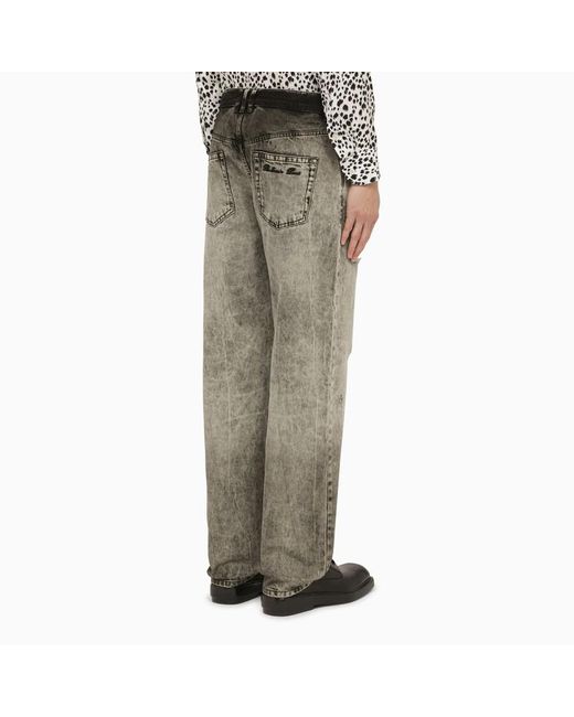 Jeans in denim délavé chiaro di Balmain in Gray da Uomo