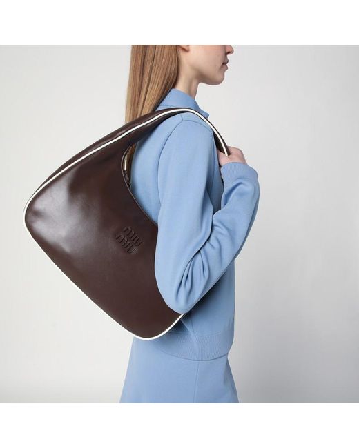 Borsa wander in pelle marrone/bianca di Miu Miu in Brown