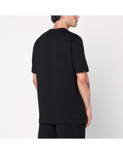 T-shirt in cotone nera con patch logo di Moncler in Black da Uomo