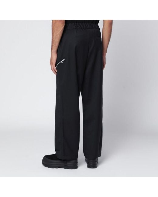 Pantaloni regs neri in misto lana di OAMC in Black da Uomo