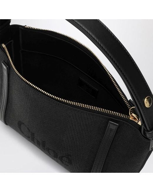 Borsa carry a righe nera in tela di Chloé in Black