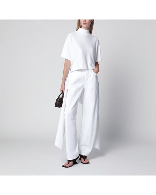 Alaïa White High-Waisted Curved-Leg Denim Jeans