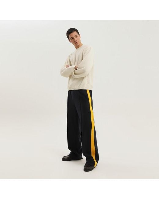 Maglione a coste con spacchi di 1989 STUDIO in Natural da Uomo