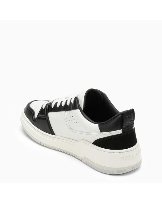 Sneaker bassa nera/bianca in pelle di Ferragamo in Black da Uomo