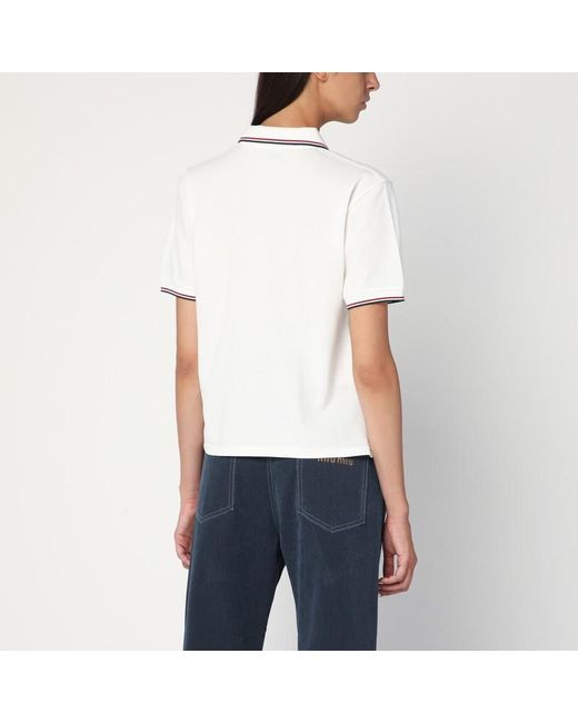 Polo a manica corta bianca con logo di Miu Miu in White