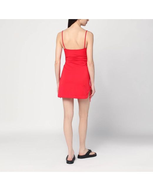 Copricostume in tessuto stretch di The Attico in Red