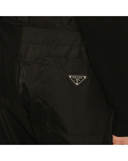 Pantalone nero in re-nylon con triangolo loro di Prada in Black da Uomo