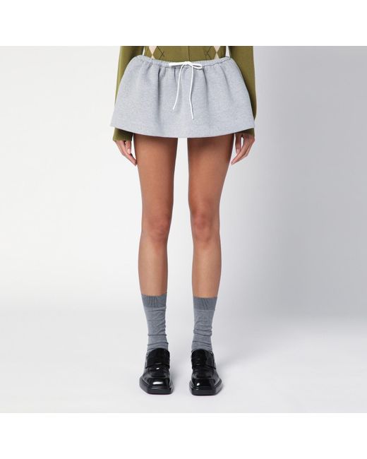 スカート MIU MIU COTTON MINI SWEAT SKIRT Miu Miu cotton-jersey Mini Skirt | White | FARFETCH
