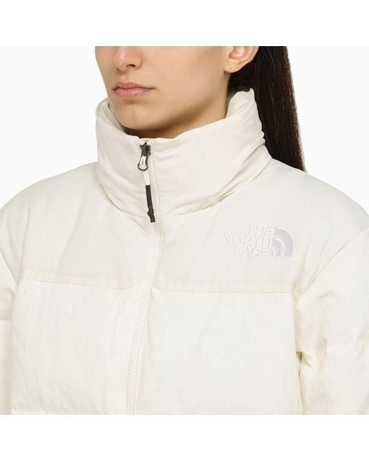 Piumino in nylon con logo di The North Face in White