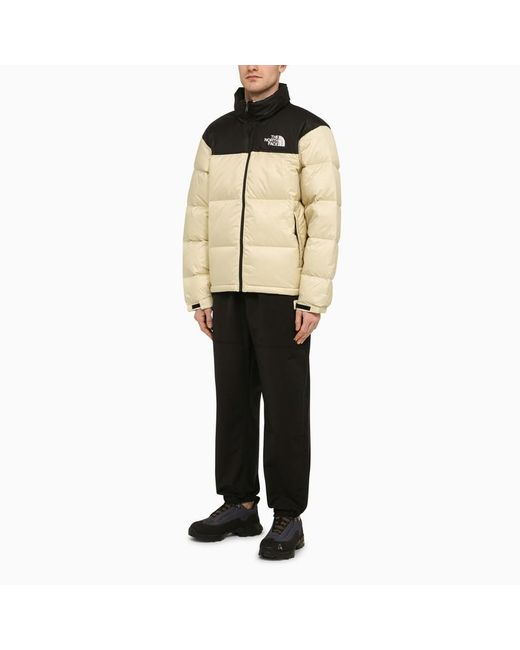 Piumino retro nuptse 1996 nero/panna di The North Face in Natural da Uomo