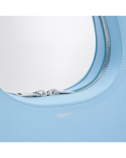 Micro baguette swipe bag azzurra in pelle di Coperni in Blue