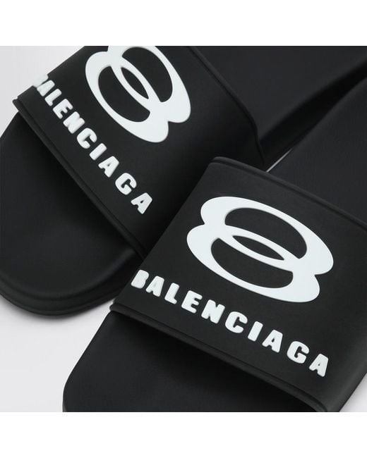 Sandali slide pool in gomma di Balenciaga in Black da Uomo