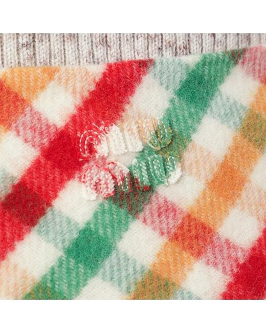 Gonna rossa/verde/soia in check e pile di Miu Miu in Orange