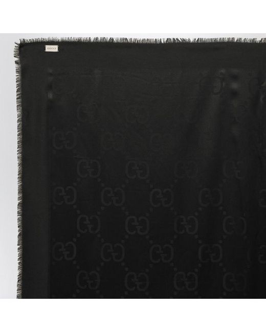 Foulard sfrangiato in gg jacquard di Gucci in Black