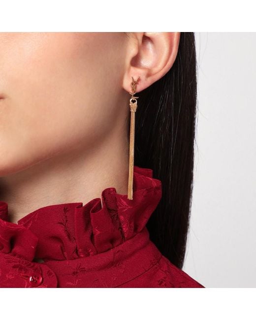 Orecchini pendenti cassandre oro di Saint Laurent in Metallic