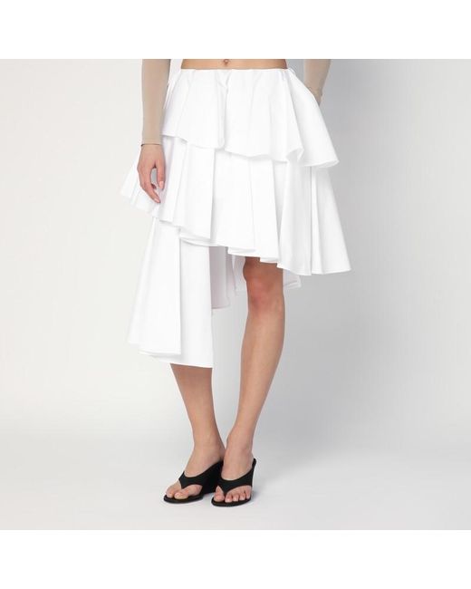 Gonna bianca asimmetrica in cotone di Alaïa in White