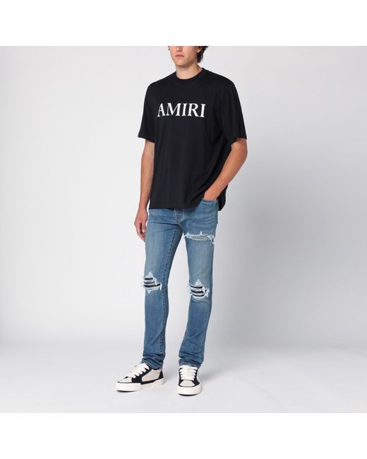 Amiri Blue Skinny Jeans With Rips for men