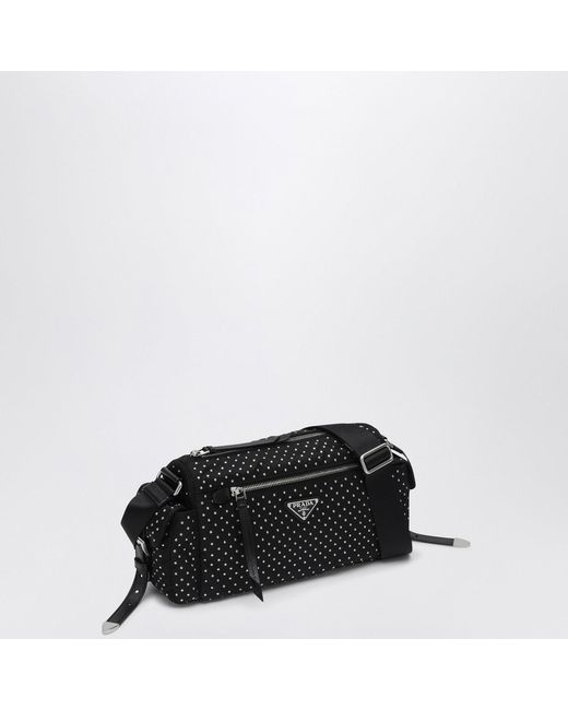 Sacca in re-nylon nera con borchie di Prada in Black