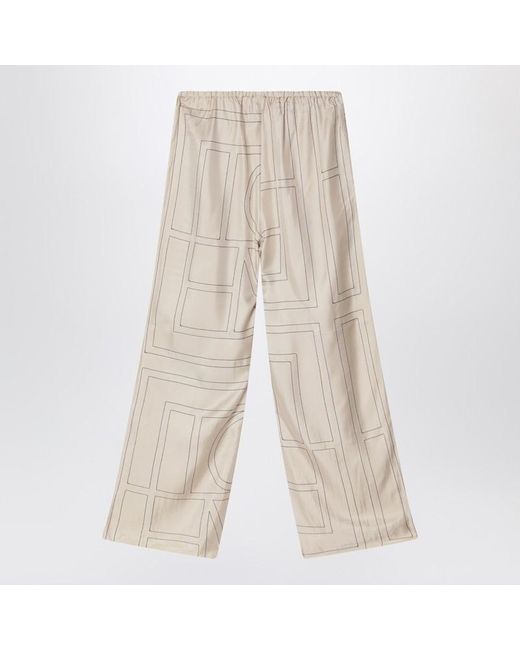Totême  Natural Monogram Ivory Silk Trousers