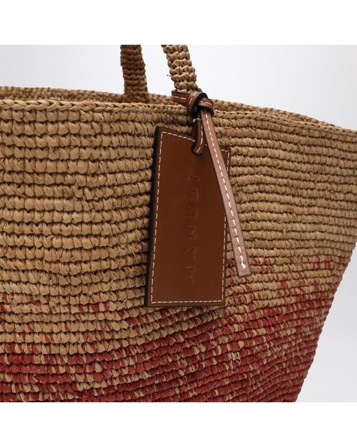 Tote grande in rafia sfumata color ruggine di Manebí in Red