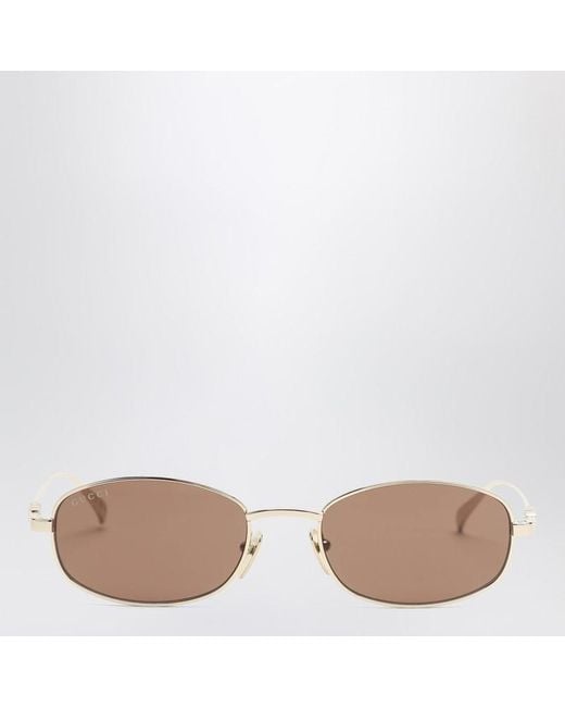 Occhiali da sole ovali oro/marroni di Gucci in Pink