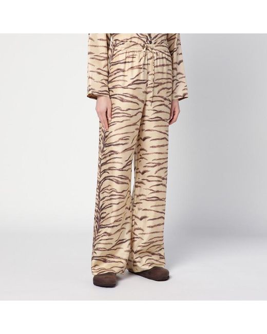 Pantalone in seta con stampa tigrata di Stella McCartney in Natural