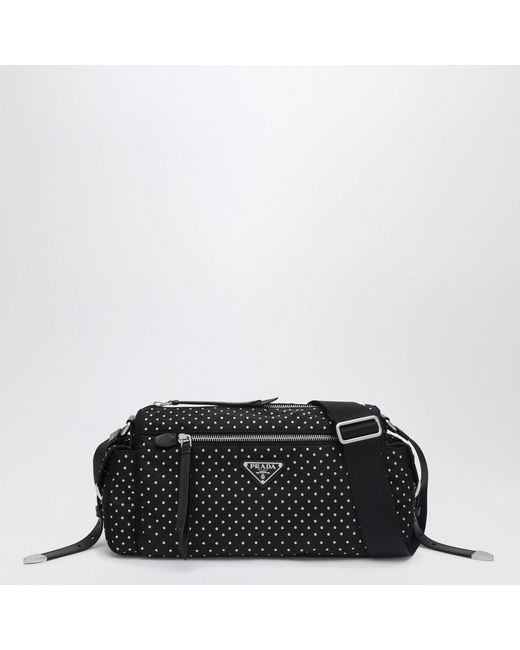 Sacca in re-nylon nera con borchie di Prada in Black