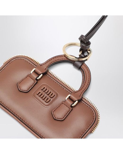Trick Arcadie Couleur Cognac En Cuir Miu Miu en coloris Brown