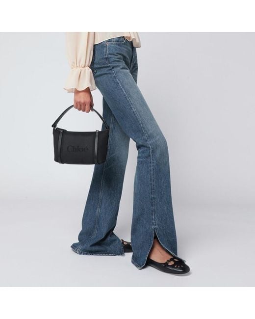 Borsa carry a righe nera in tela di Chloé in Black