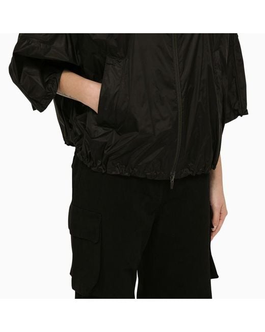 Giacca impermeabile nera con zip di Herno in Black